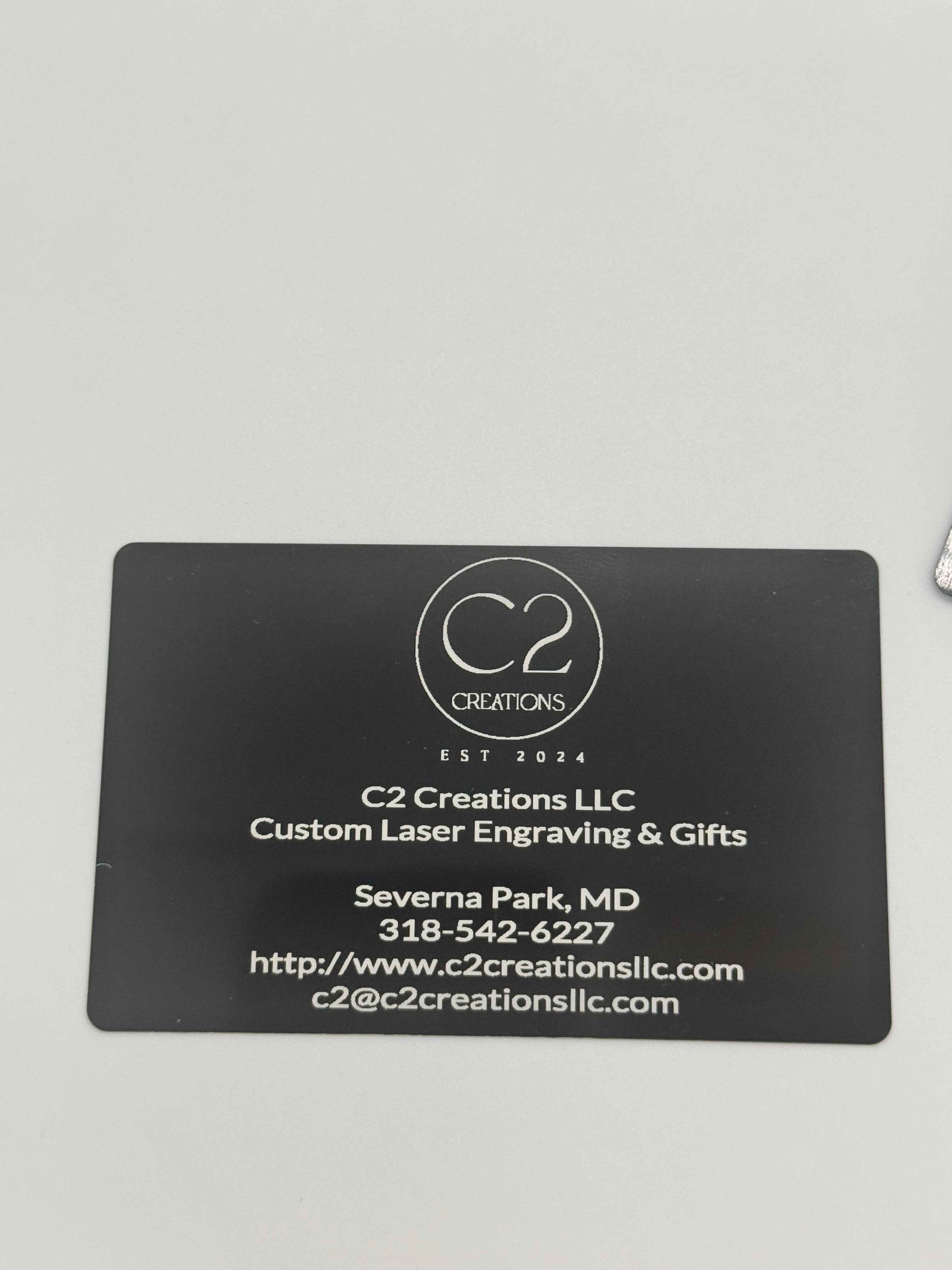 Custom laser engraved metal business cards with premium finish